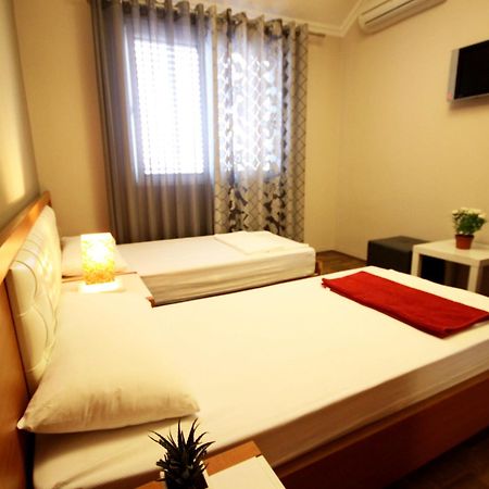 Hotel Bylis Tirana Szoba fotó