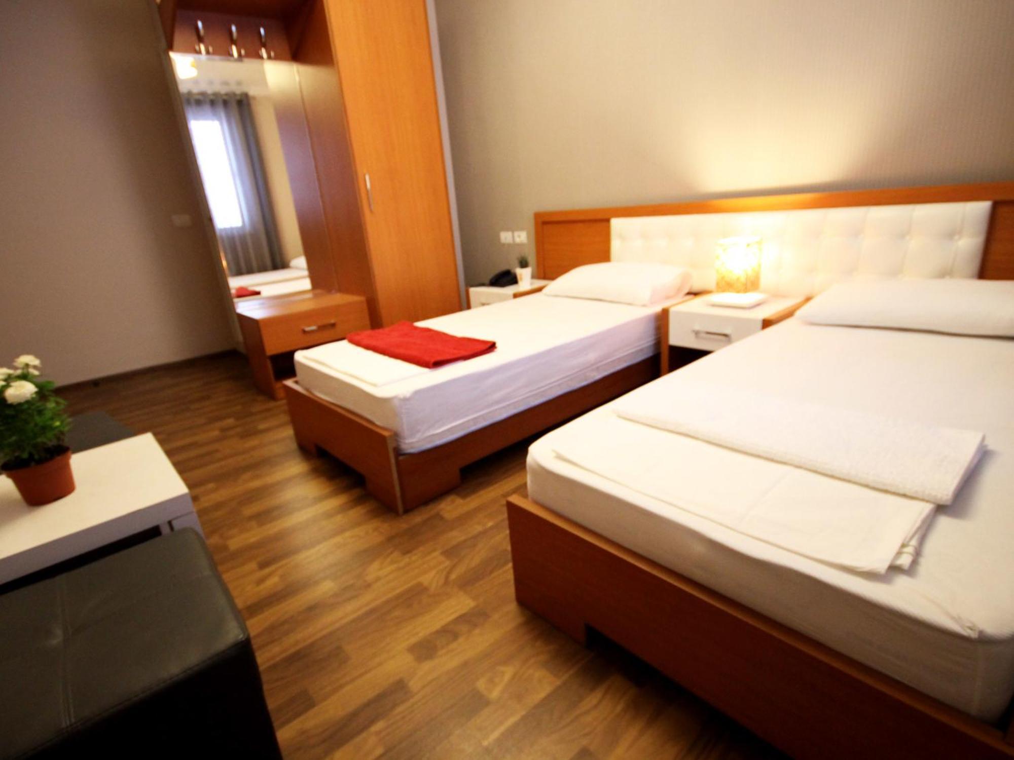 Hotel Bylis Tirana Szoba fotó