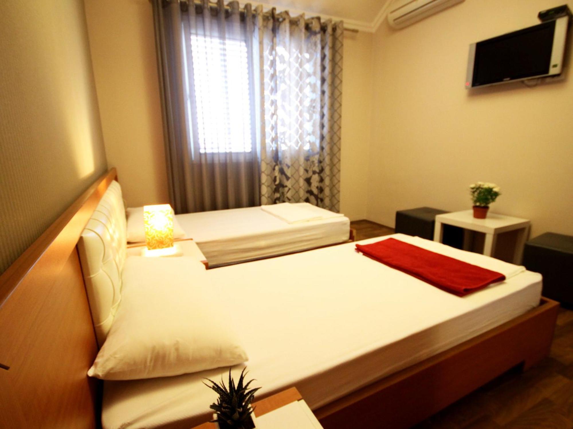 Hotel Bylis Tirana Szoba fotó