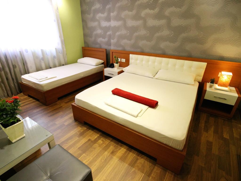 Hotel Bylis Tirana Szoba fotó