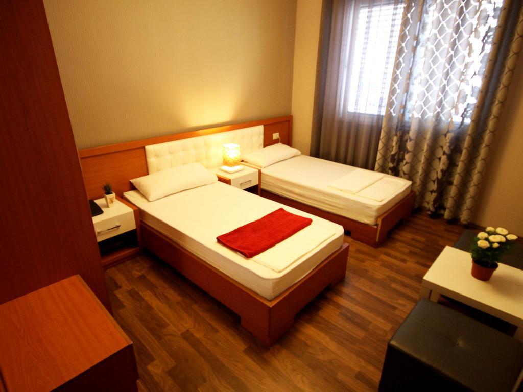 Hotel Bylis Tirana Szoba fotó